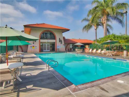 The inviting pool area at ORANGELAND RV PARK