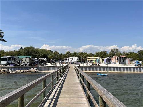 The wooden pier to the RV sites at NAVARRE BEACH CAMPING RESORT