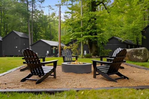 Fire pit with chairs around it at Roamstead