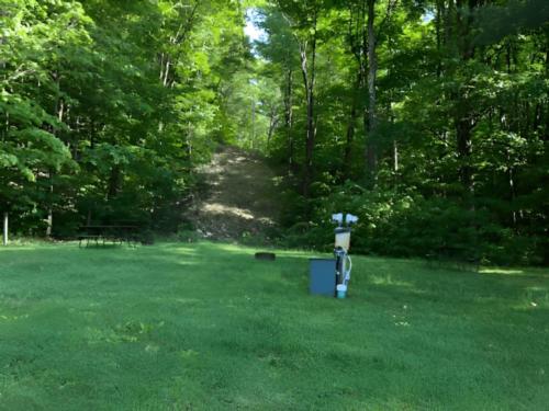 Open RV space at site Pine Hollow Campground