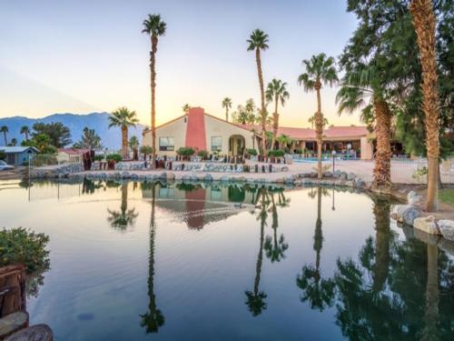 Clubhouse and pond at Caliente Springs Resort