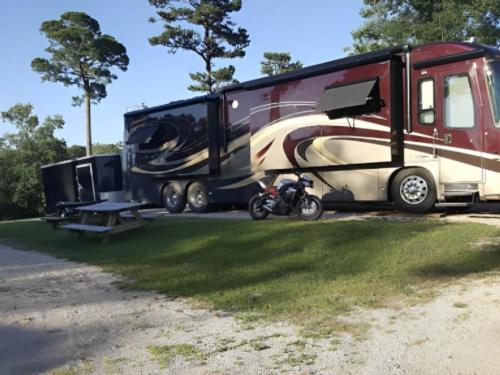 Parked RV at site Wanderlust RV Park