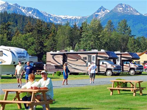 Campers in picnic area near RV campground at HAINES HITCH-UP RV PARK