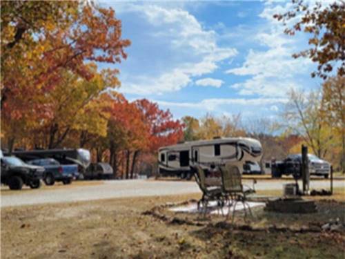 Trucks and trailers in RV sites at HICKORY RIDGE CAMPGROUND