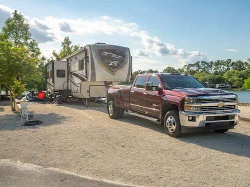 Truck with trailer Flamingo Lake Sun RV Communities