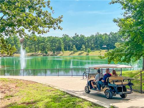 People in a  golf cart
