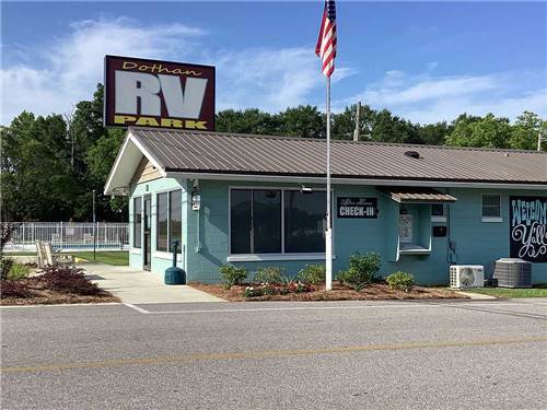 The office building with a flag at DOTHAN RV PARK