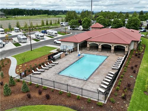 Aerial view of the fenced-in pool area at Olde Stone RV Resort