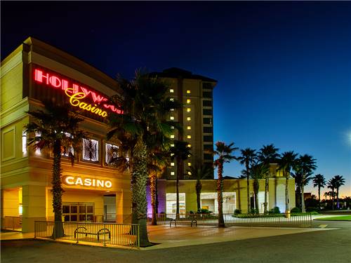 Exterior night time view of casino at HOLLYWOOD CASINO RV PARK- GULF COAST