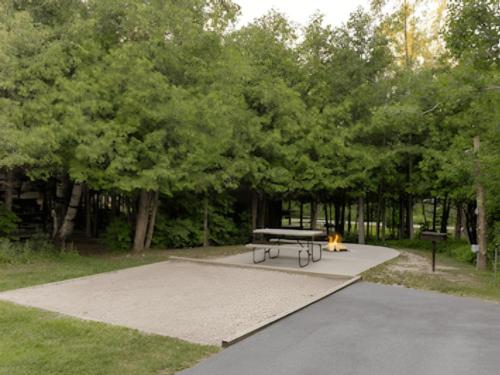 Open RV space next to panic area at Jellystone Park Petoskey
