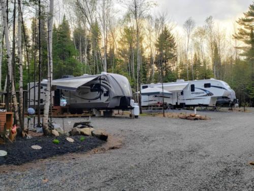Parked trailers at site Spacious Skies Balsam Woods