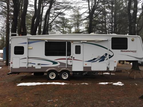 Parked RV at site Royal Mountain Campground