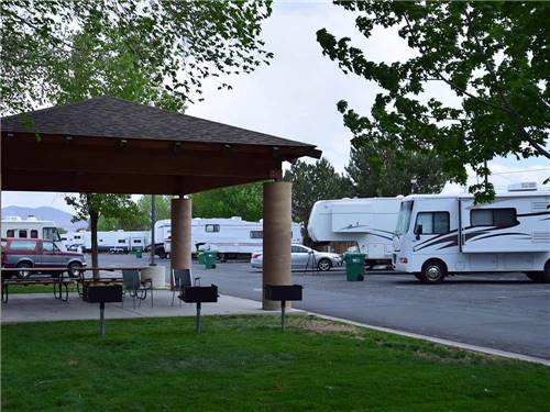 Patio and RVs and trailers at SILVER SAGE RV PARK