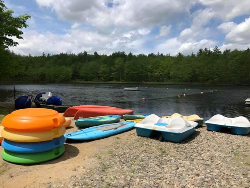Water vehicles and toys by the lake